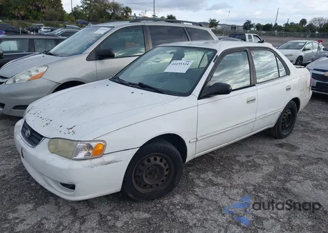 2001 Toyota Corolla Le from USA, damaged, VIN 2T1BR12E61C466391